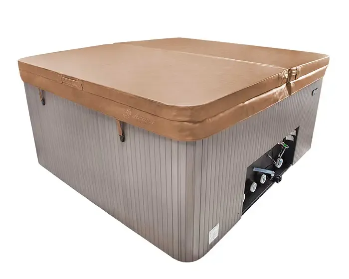 A hot tub fitted with an insulated cover