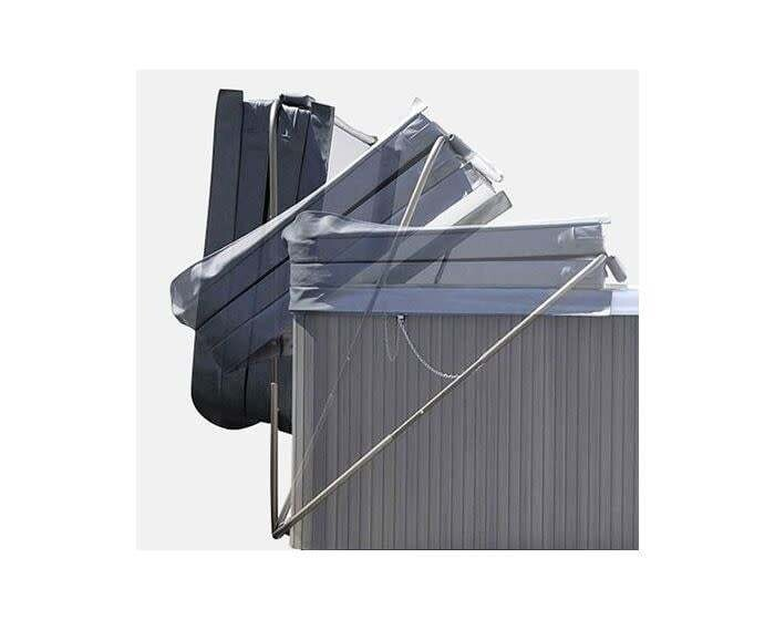 A cover lifter holding a hot tub cover open